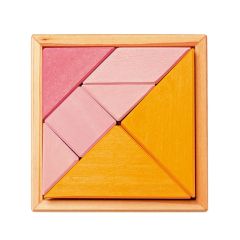 Tangram de madera naranja y rosa con librito - Grimm's